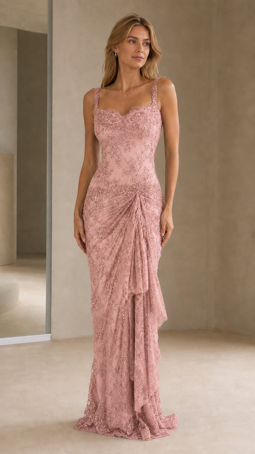 Front view of model wearing blush pink beaded evening gown