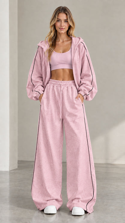 Model wearing Dusty Pink two-piece zip hoodie and wide-leg pants set