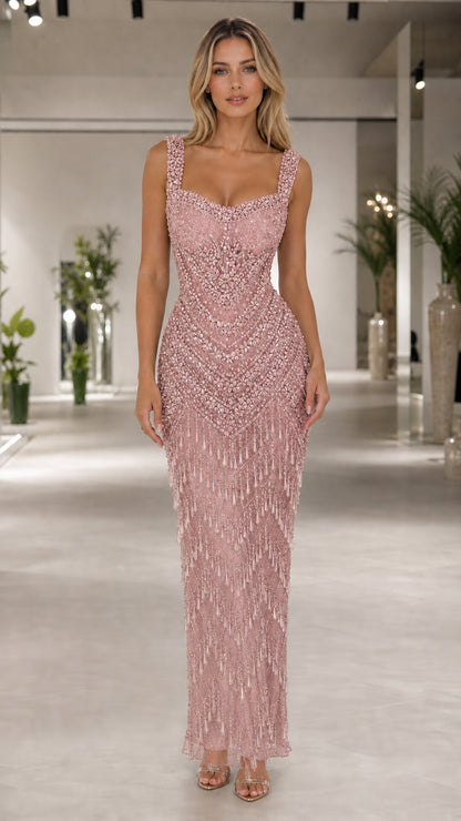 Front view of blush pink embellished beaded fringe evening gown
