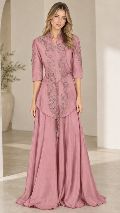 Front view of dusty rose embroidered formal maxi gown with beaded details