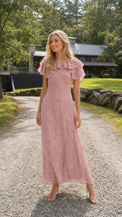 Full length photo of model in dusty pink floral lace flutter sleeve maxi gown