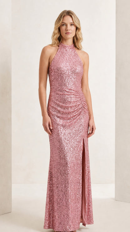 Front full-length view of model wearing the blush pink halter sequin evening maxi gown