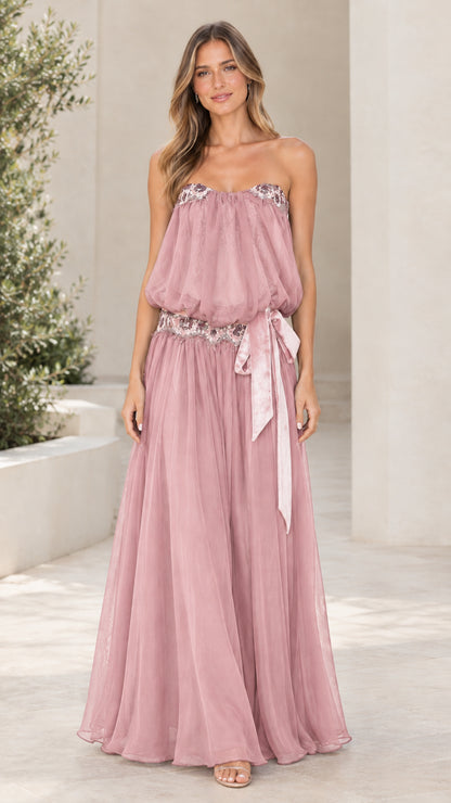 Model wearing Dusty Rose strapless blouson maxi dress