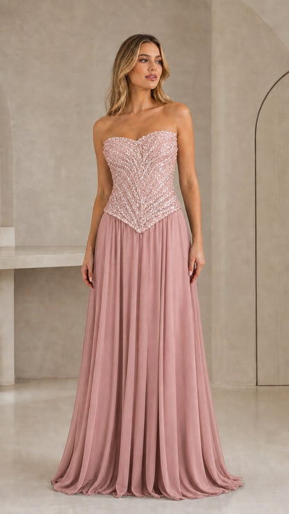 Full-length front view of dusty pink strapless sequin basque waist maxi gown