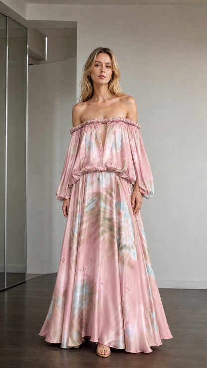 Model wearing pink multi tie-dye off-the-shoulder maxi dress