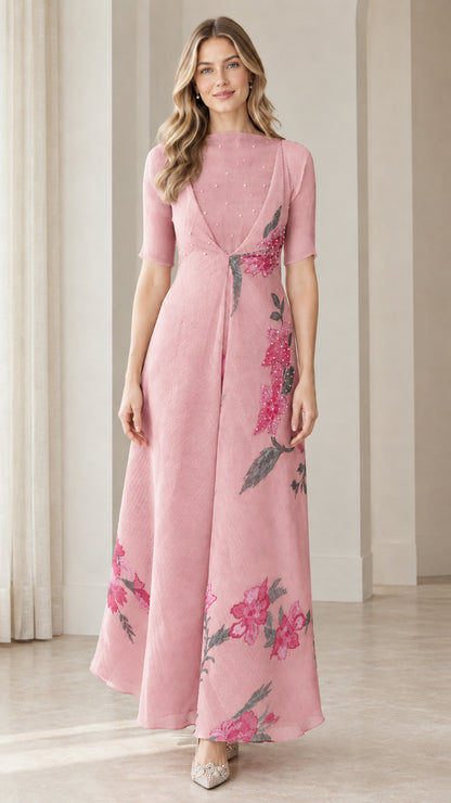 Front view of dusty pink floral embroidered evening gown with draped waist