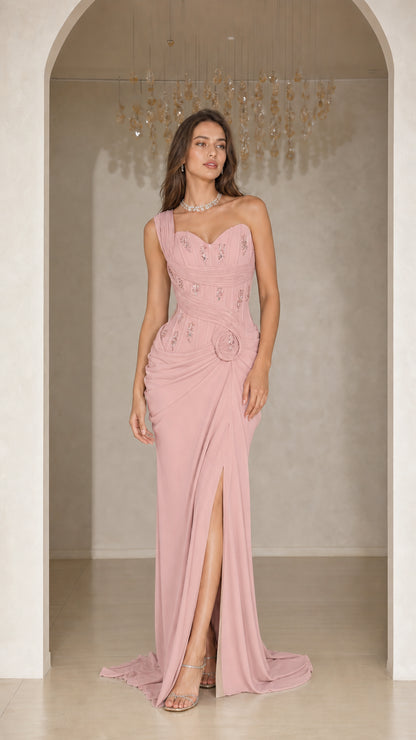 Woman wearing dusty pink one-shoulder ruched maxi formal gown