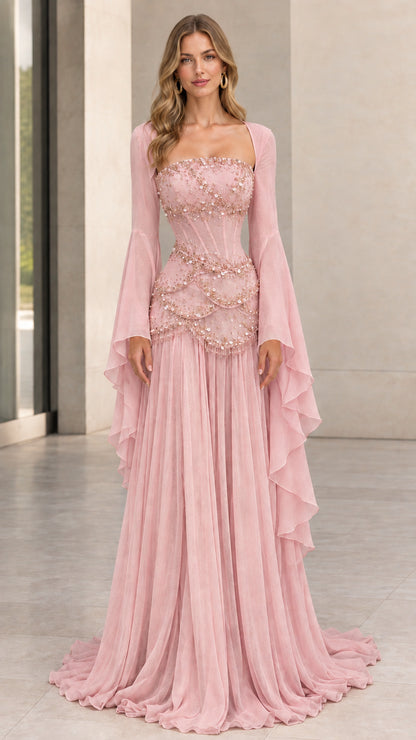 Full-length front view of blush pink embellished corset evening dress with flared sleeves
