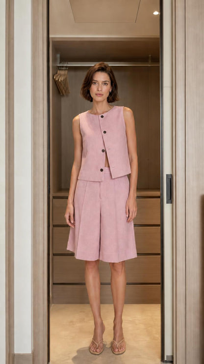 Front view of woman wearing pink matching set