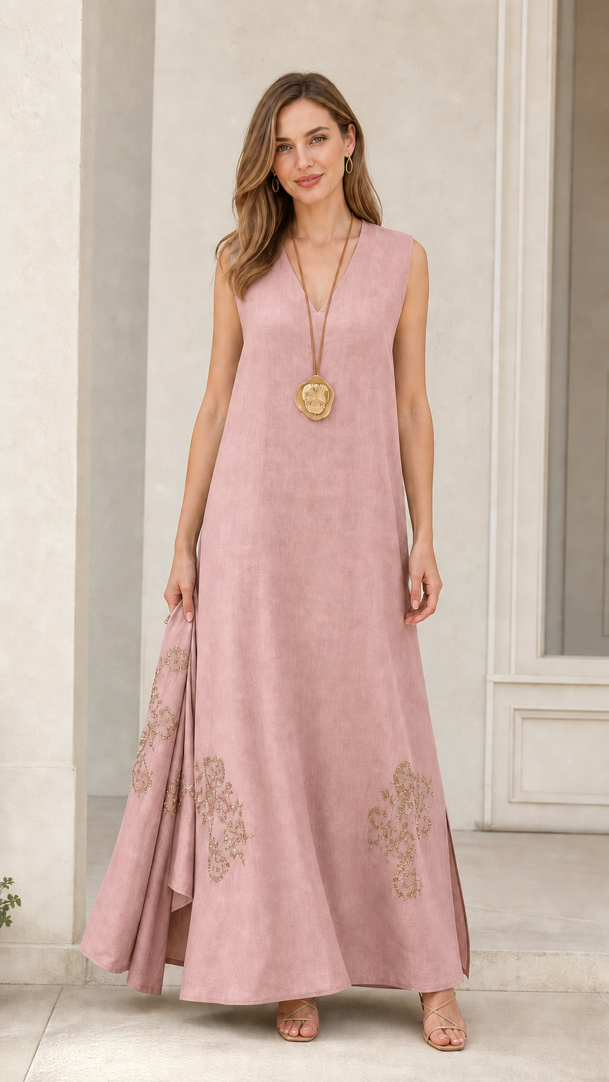 Front view of model wearing dusty pink sleeveless maxi dress