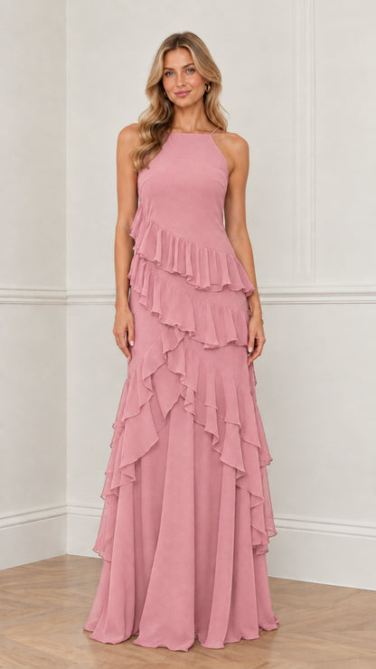 Model wearing dusty pink halter tiered ruffle bridesmaid dress