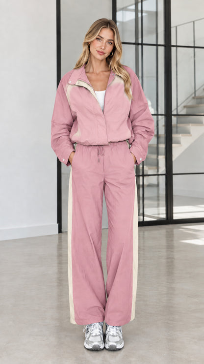 Model wearing Dusty Pink and beige two-tone casual tracksuit set