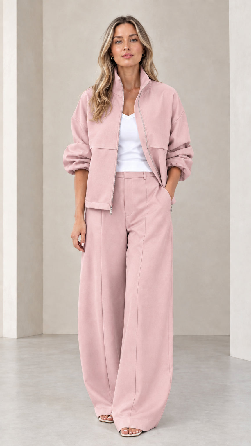 Full front view of women's dusty pink zip-up jacket and wide-leg pants two-piece set