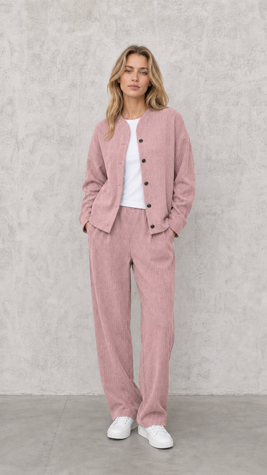 Model wearing Dusty Pink textured button-down jacket and wide-leg pants set