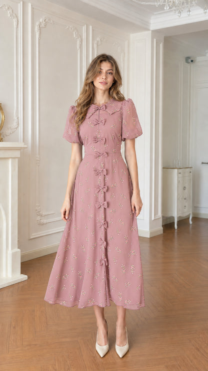 Full front view of dusty pink floral bow-front midi dress