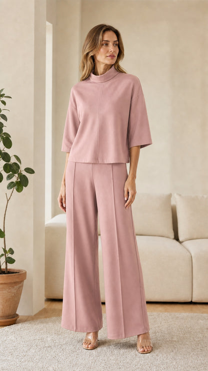 Woman wearing dusty pink two-piece lounge set