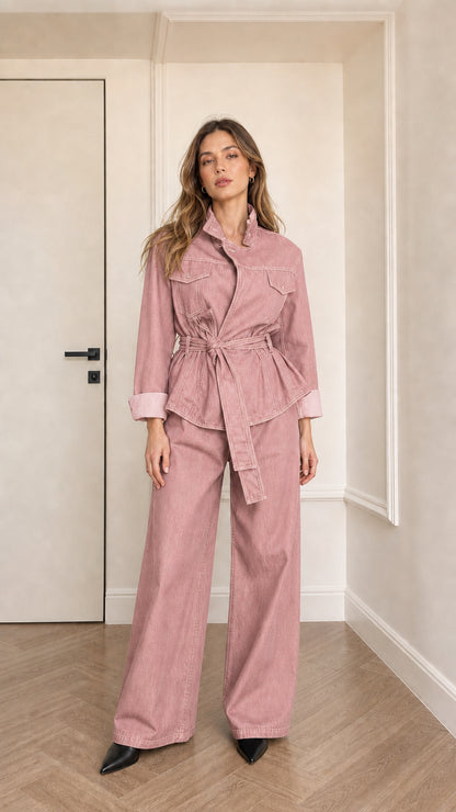 Model wearing pink denim utility jacket and matching pants
