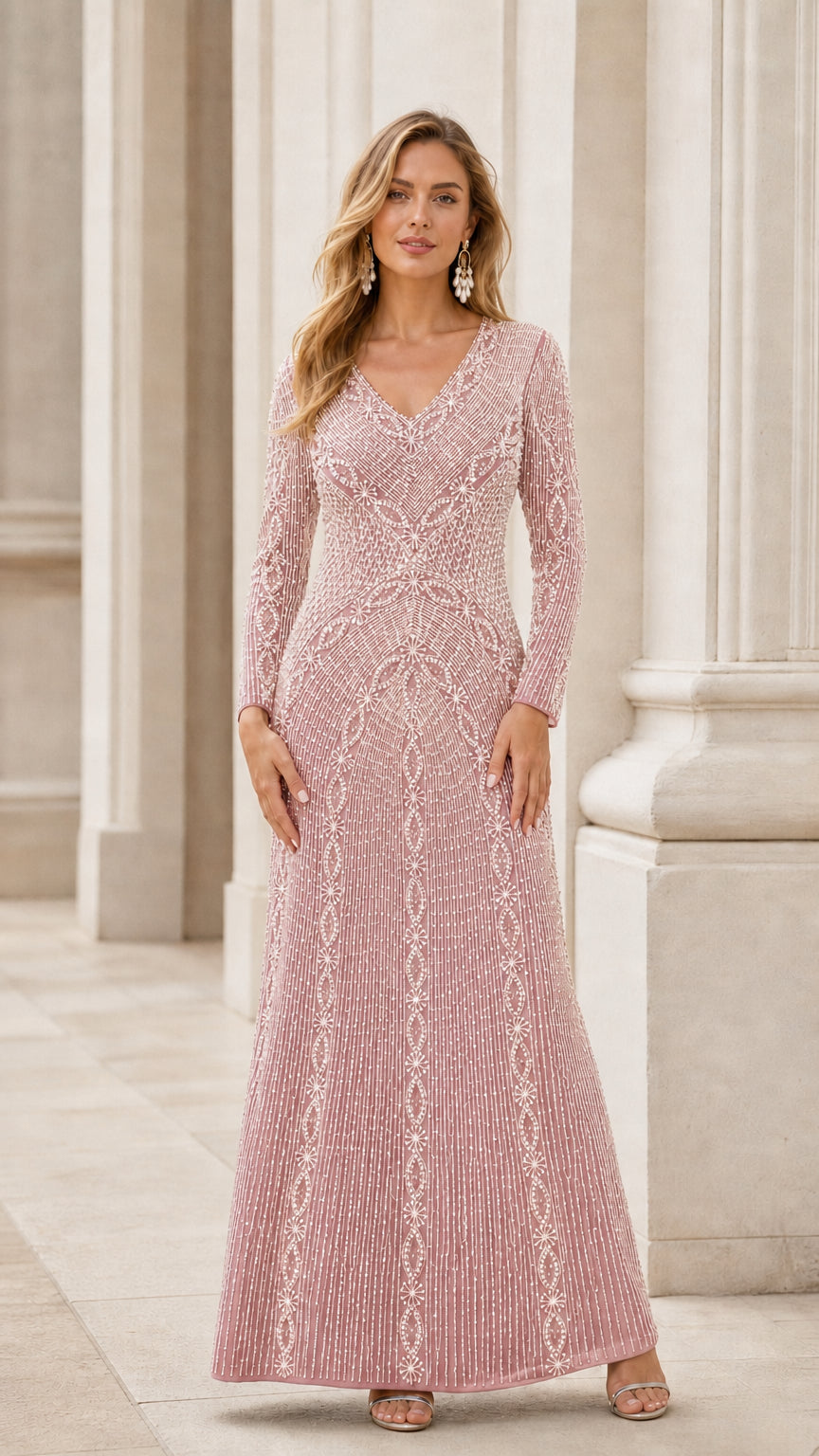 Front view of blush pink long sleeve beaded evening dress