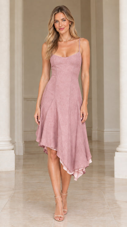 Front view of model wearing dusty rose pink asymmetrical hem midi dress