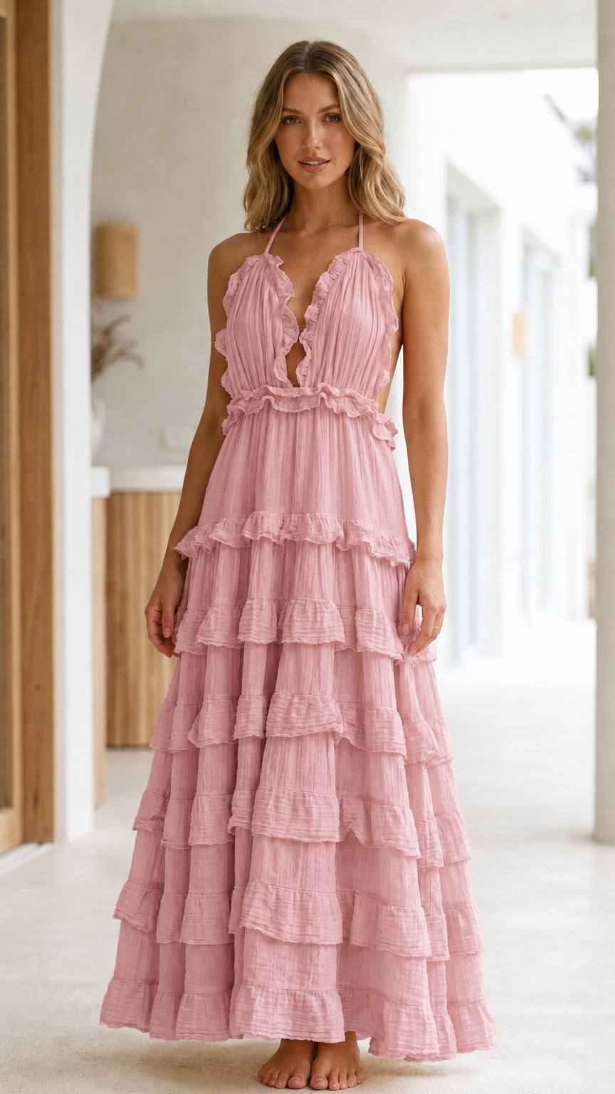 Model wearing Pink Boho Ruffle Halter Backless Tiered Maxi Dress