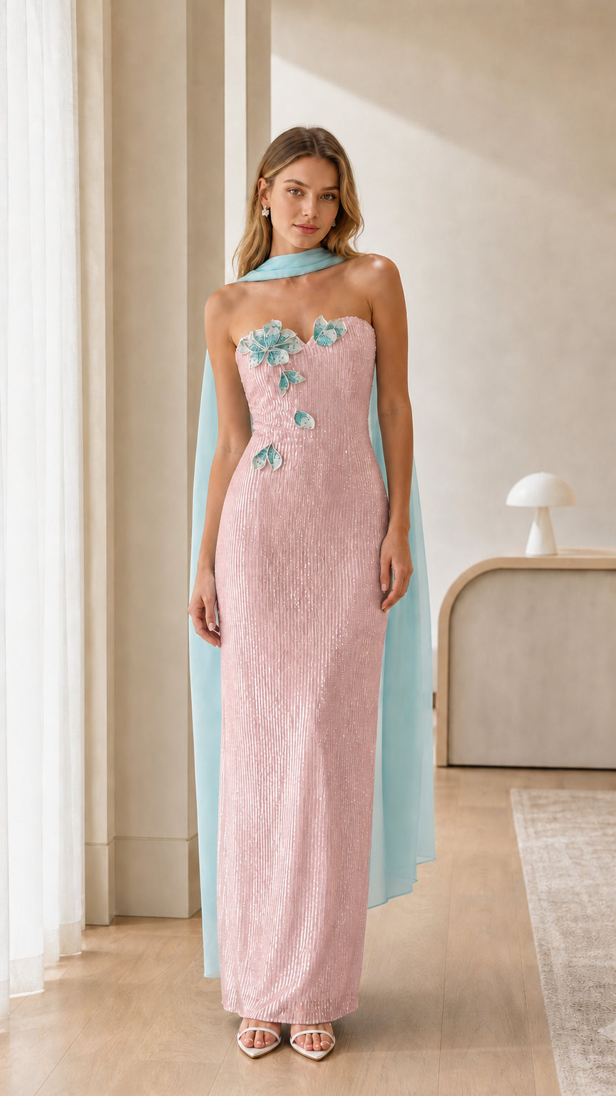 Blush pink strapless sequin formal gown with floral appliques and chiffon cape scarf