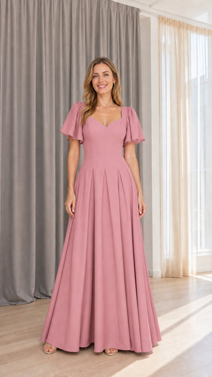Front view of model wearing dusty rose formal maxi dress