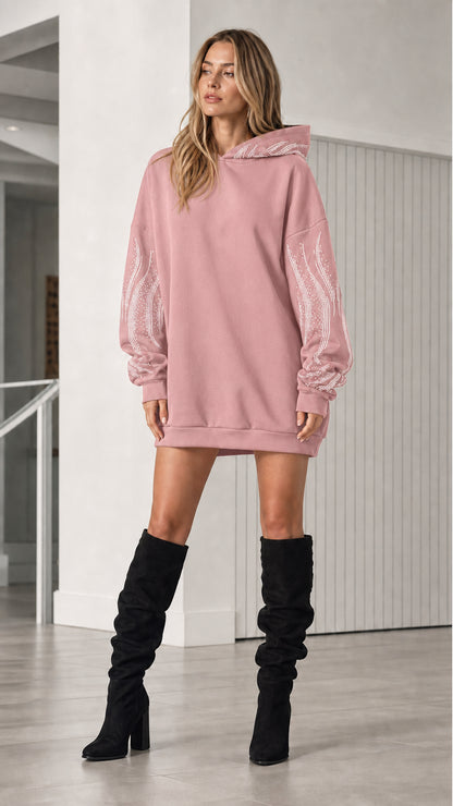 Front view of model in pink rhinestone oversized hoodie dress
