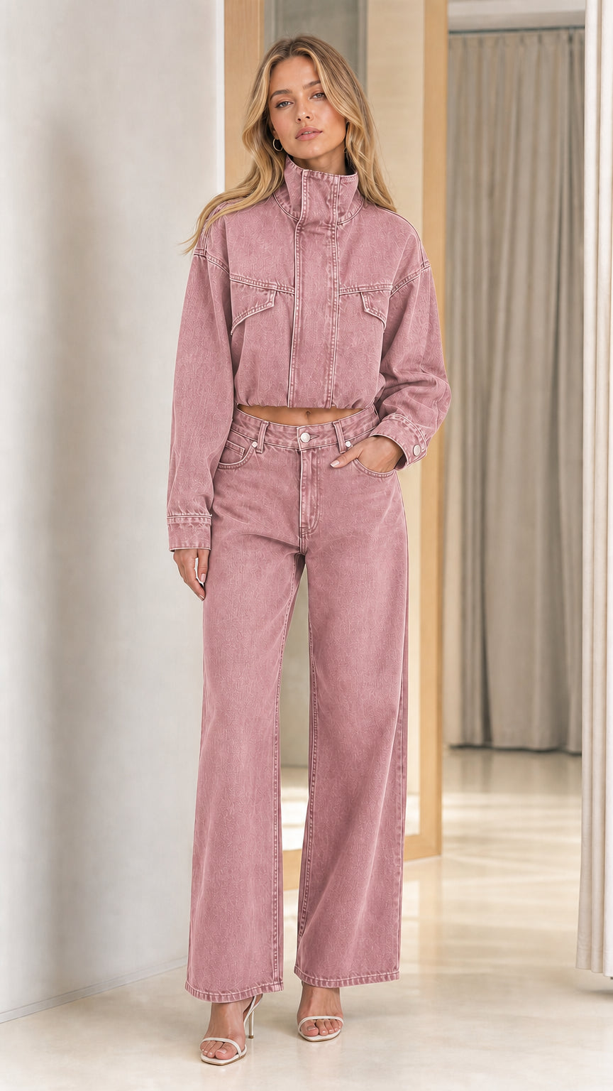 Model wearing dusty rose pink washed cropped denim jacket and wide leg jeans co ord set