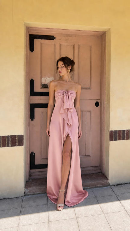 Pink strapless evening dress with front bow and high slit