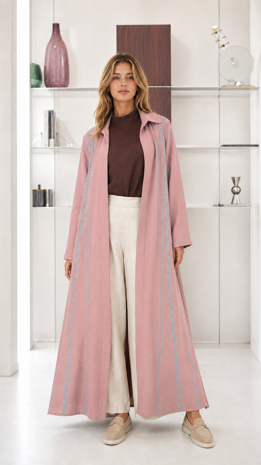 Model wearing Dusty Pink collared open front maxi abaya duster