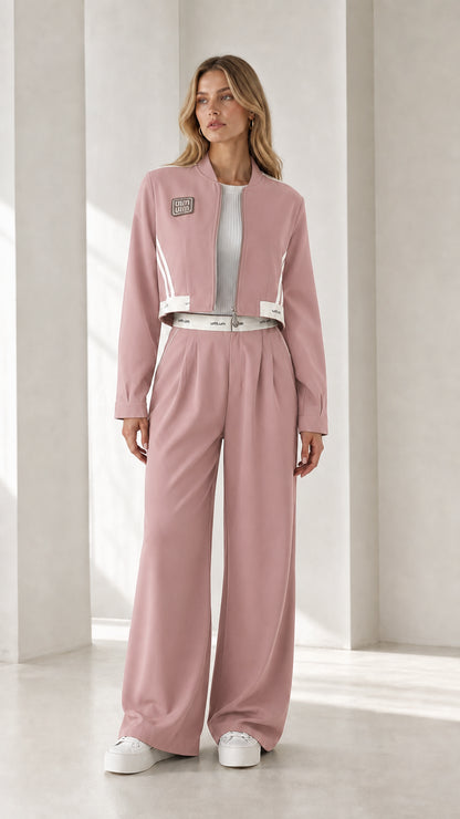 Full view of model wearing dusty pink cropped jacket and wide-leg pants set