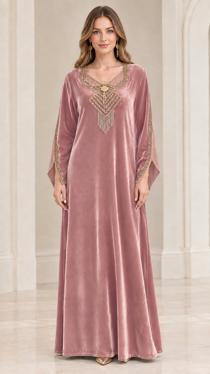Front view of dusty rose velvet kaftan maxi dress with intricate neckline beading
