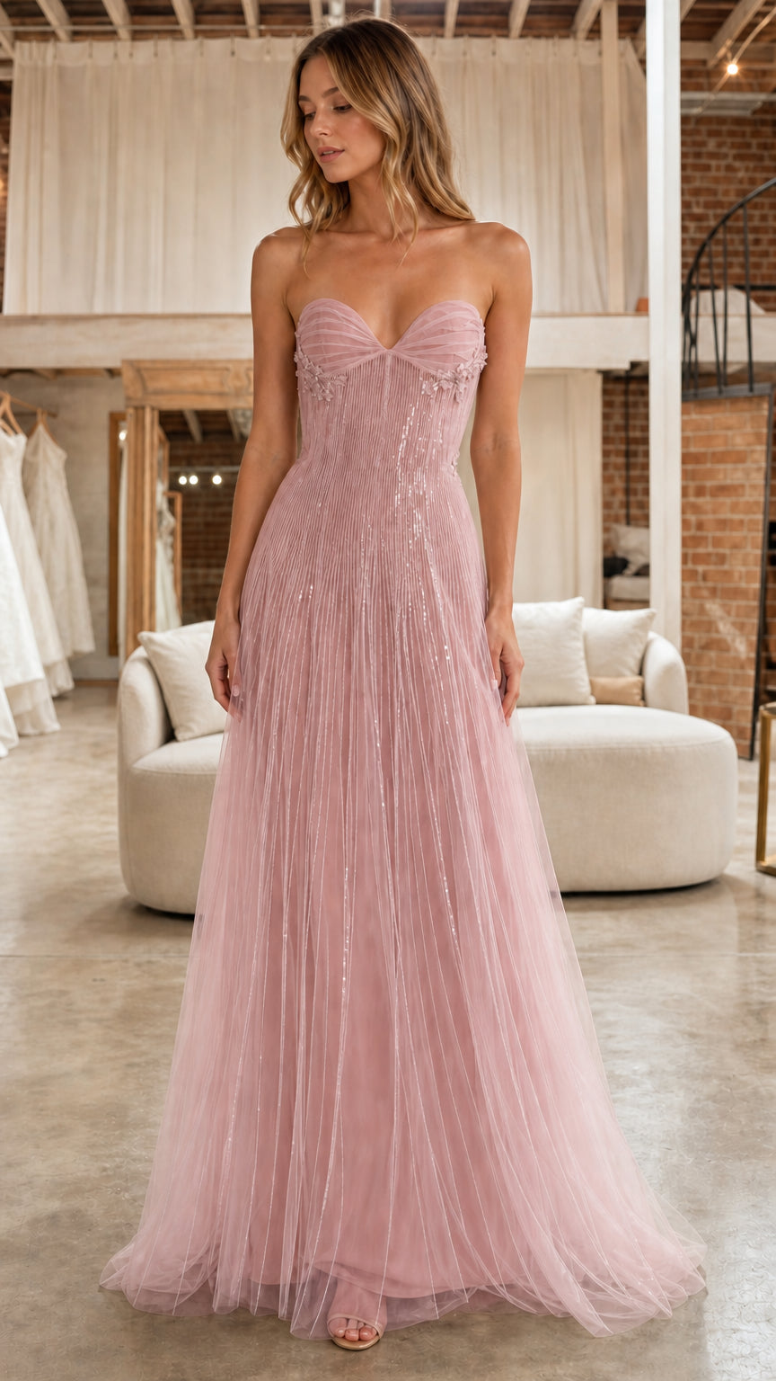 Front full view of model in the dusty pink strapless beaded tulle formal dress