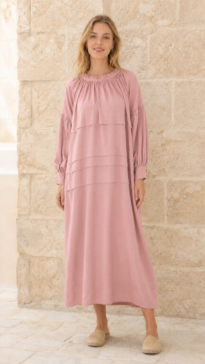 Full front view of model wearing pink tiered maxi dress