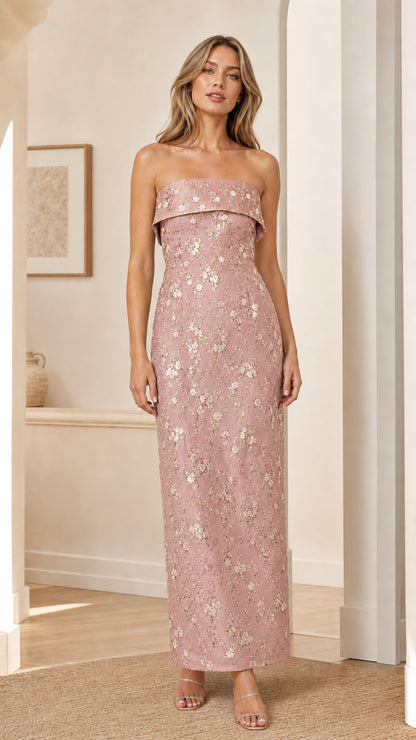 Model wearing blush pink strapless floral embroidered maxi dress