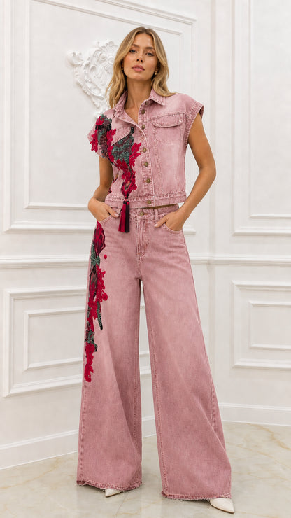 Model wearing pink embroidered denim matching set