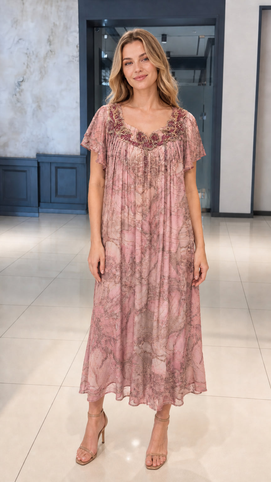 Front view of dusty pink printed pleated midi dress with embellishments