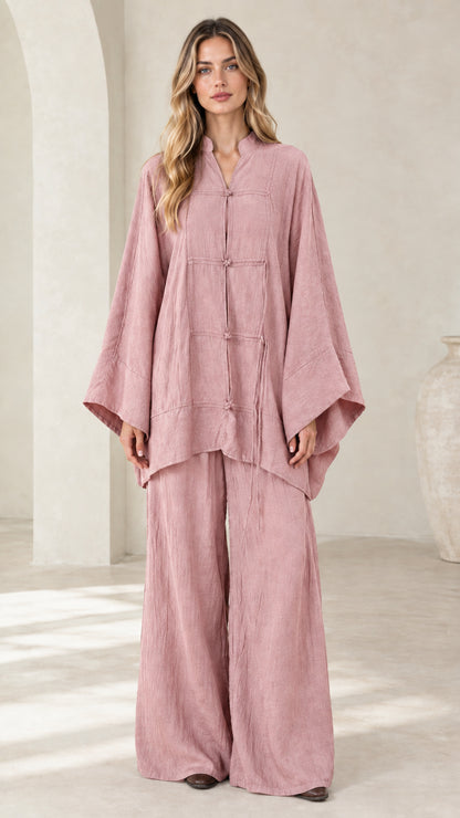 Front view of women's dusty pink frog button tunic and wide leg pant set