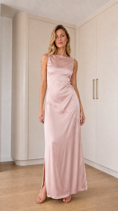 Front full-length view of model wearing blush pink sleeveless satin maxi dress