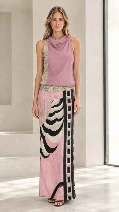 Front full-length view of model wearing dusty pink sleeveless cowl neck abstract maxi dress