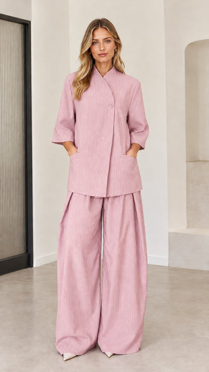Dusty pink pinstripe women's co-ord set with asymmetric button top and pleated pants