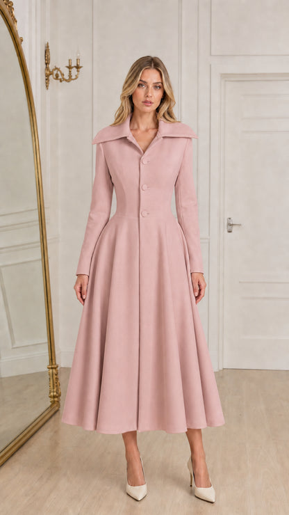 Model wearing dusty pink vintage style swing midi coat dress