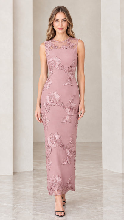 Model wearing dusty rose floral appliqué sleeveless column maxi dress