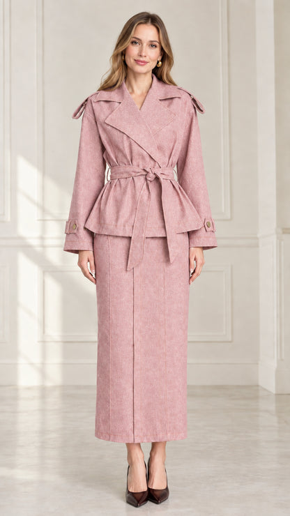 Front full-length view of women's dusty pink belted trench jacket and maxi skirt set