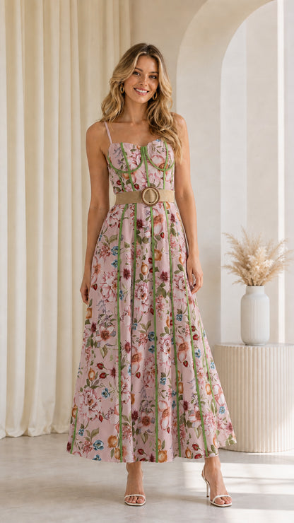 Model wearing pink floral corset maxi dress