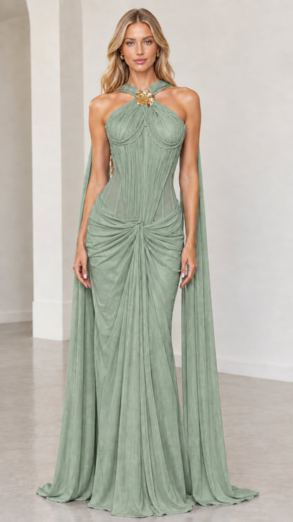 Front view of sage green halter corset evening gown with waist draping