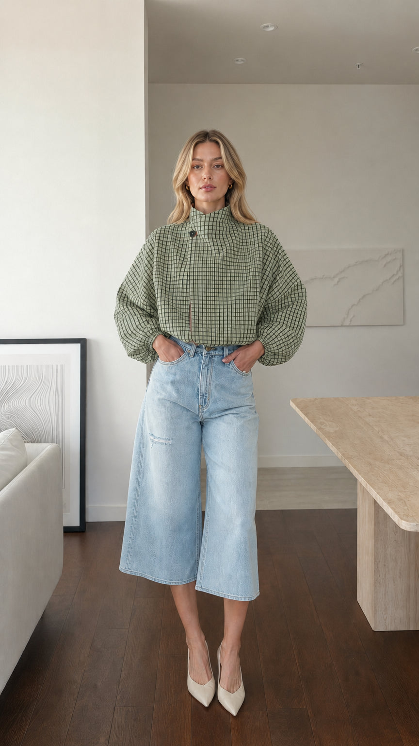Model wearing green plaid high-neck blouse