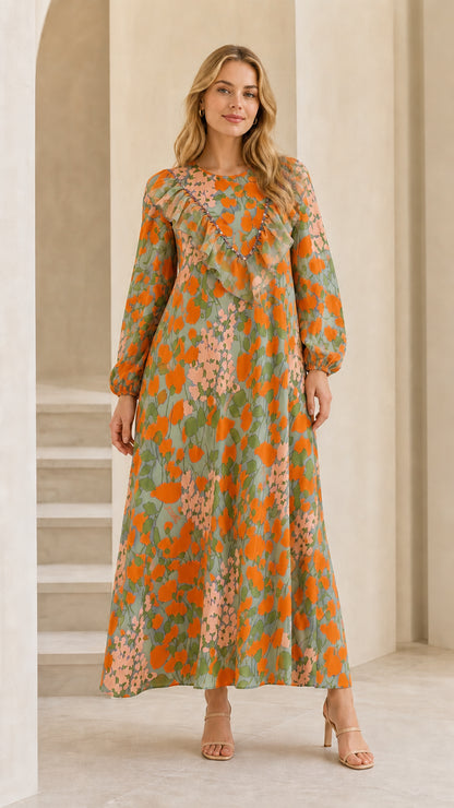 Full front view of model wearing sage green floral long sleeve maxi dress