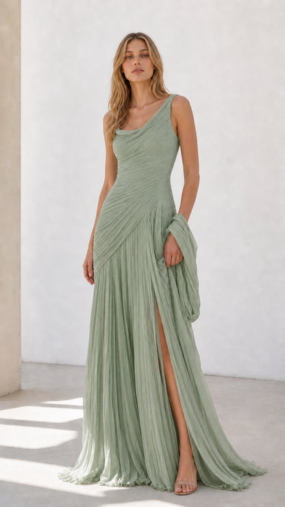 Full view of sage green pleated formal gown with side slit and shawl