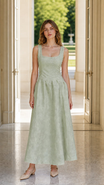 Model wearing sage green variant of the midi dress